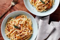 Brown butter and sage create a rich, complex sauce for this simple pasta. Half-moons of squash cook quickly in a large skillet. <a href="https://www.epicurious.com/recipes/food/views/pasta-with-delicata-squash-and-sage-brown-butter?mbid=synd_yahoo_rss" rel="nofollow noopener" target="_blank" data-ylk="slk:See recipe." class="link rapid-noclick-resp">See recipe.</a>