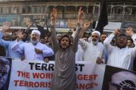 People protest against the publications of the cartoon of Prophet Mohammad in France and comments by the French President Emmanuel Macron, in Peshawar