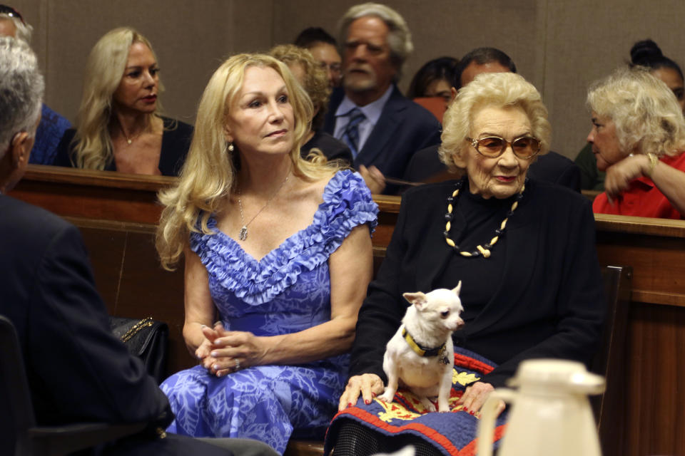 FILE - Abigail Kawananakoa, right, and her wife Veronica Gail Worth, appear in state court in Honolulu on Sept. 10, 2018. There will be at least $100 million leftover to fund Native Hawaiian causes from the estate of the so-called last Hawaiian princess who died last year at age 96. According to court documents filed last week in the probate case for the estate of Abigail Kawānanakoa, $40 million will go to her wife. (AP Photo/Jennifer Sinco Kelleher, File)