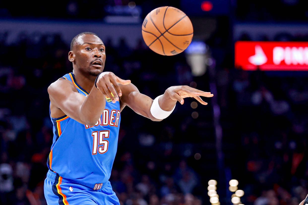 Oklahoma City center Bismack Biyombo (15) passes the ball in the fourth quarter during an NBA game between The Oklahoma City Thunder and The San Antonio Spurs at the Paycom Center in Oklahoma City, on Wednesday, April 10, 2024.