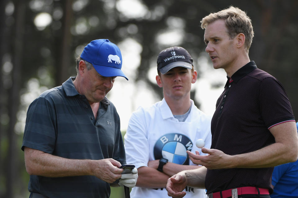 VIRGINIA WATER, ENGLAND - MAY 23:  Piers Morgan chats with Dan Walker during the Pro Am for the BMW PGA Championship at Wentworth on May 23, 2018 in Virginia Water, England.  (Photo by Ross Kinnaird/Getty Images)