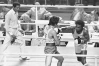 FILE - In this July 29, 1976, file photo, the United States' Sugar Ray Leonard, right, throws a right at Kazmier Szczerba, of Poland, during the light welterweight boxing match at the Summer Olympic Games in Montreal. (AP Photo/File)