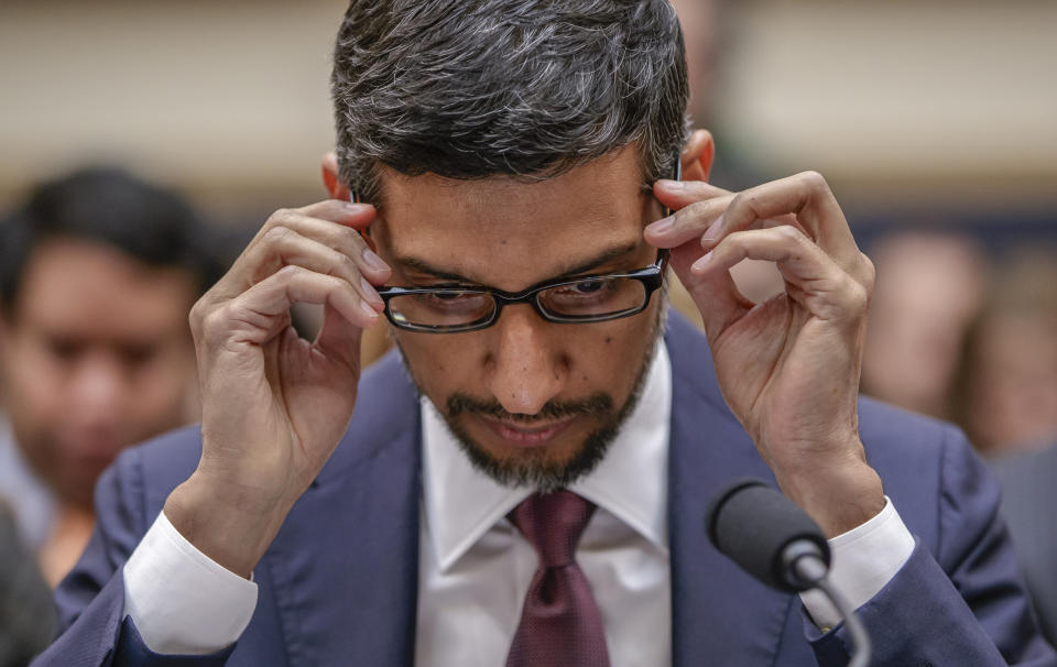 FILE - In this Dec. 11, 2018, file photo Google CEO Sundar Pichai appears before the House Judiciary Committee to be questioned about the company's privacy security and data collection, on Capitol Hill in Washington. Google co-founders Larry Page and Sergey Brin are stepping down from their roles within the parent company, Alphabet. Pichai will stay in his role and also become CEO of Alphabet. (AP Photo/J. Scott Applewhite, File)