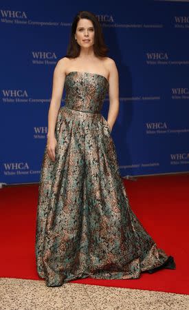 Actress Neve Campbell arrives on the red carpet for the annual White House Correspondents Association Dinner in Washington, U.S., April 30, 2016. REUTERS/Jonathan Ernst