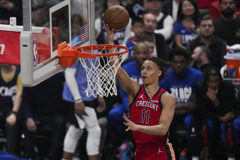 New Orleans Pelicans guard Dyson Daniels (11) shoots during the first half of an NBA basketball game against the Los Angeles Clippers in Los Angeles, Wednesday, Feb. 7, 2024. (AP Photo/Ashley Landis)