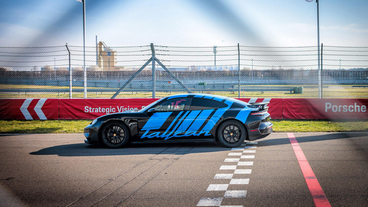  Porsche Taycan GT Turbo on track. 