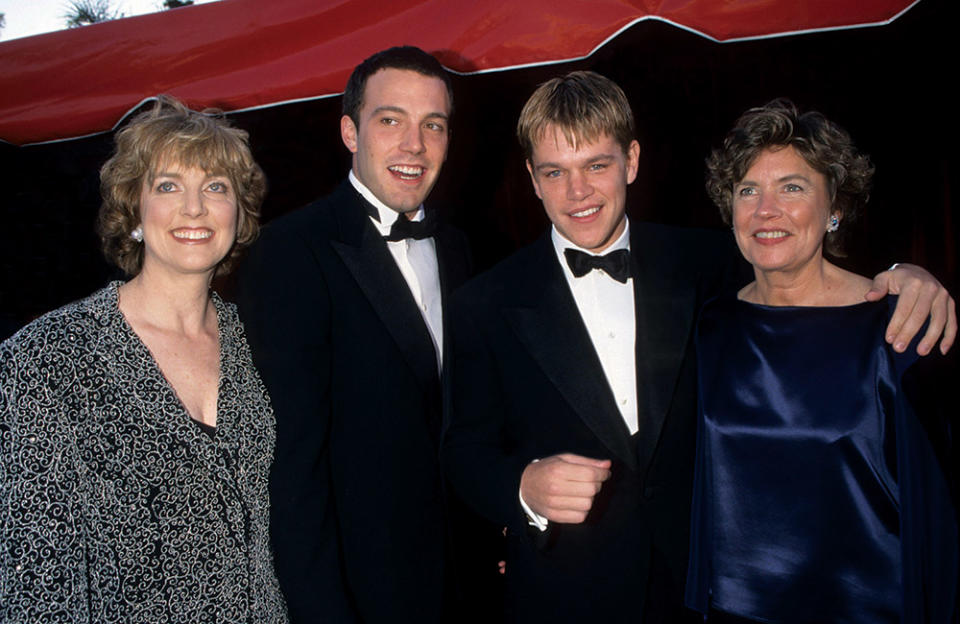 Good Will Hunting screenwriters Ben Affleck and Matt Damon, flanked by their mothers.