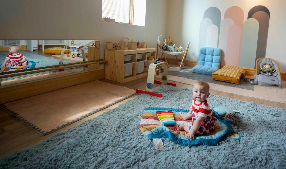 Francis Oâ€™Neil, 9-month-old seen playing in one of the child care spaces Tuesday, Aug. 8, 2023, at Le Village Cowork which combines child care and a co-working space so working women can be near their children at 301 E. Reservoir Ave., Milwaukee. There are three different age groups: the wigglers ages 3 months to 17 months, the wobblers 18 months to 2 and the explorers ages 2-4.