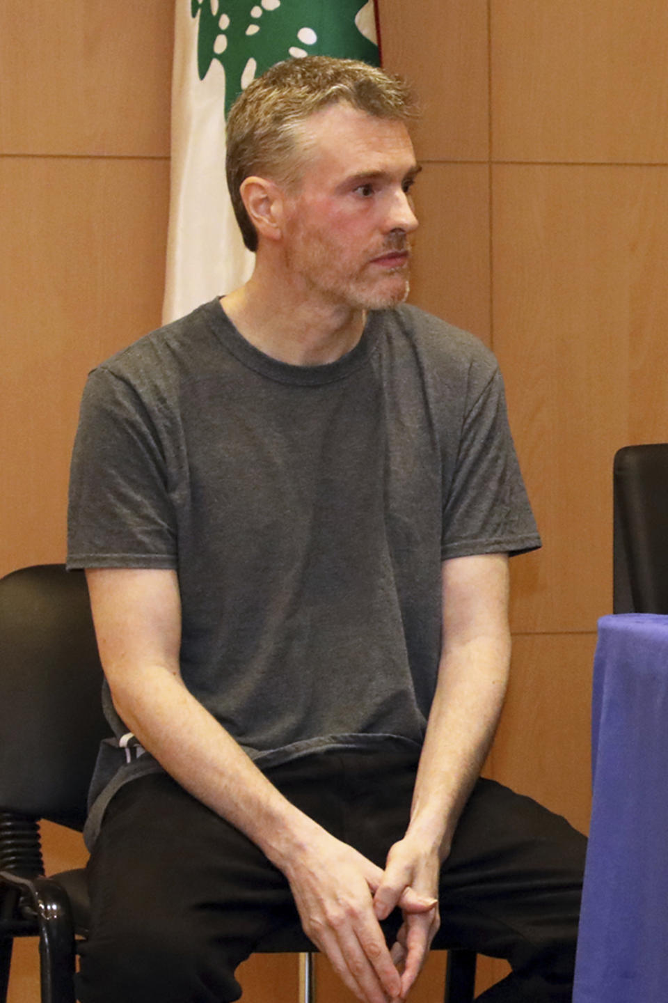 This handout photo by the Lebanese General Security Directorate, shows Canadian citizen Kristian Lee Baxter, during a press conference in Beirut, Lebanon, Friday, Aug 9, 2019. Baxter held in Syrian prisons since last year and freed after Lebanese mediation said Friday he had no idea if anyone knew he was still alive. The Lebanese general who mediated his release said Baxter was heading home. It was not clear when Baxter was released from Syria. (The Lebanese General Security Directorate via AP)