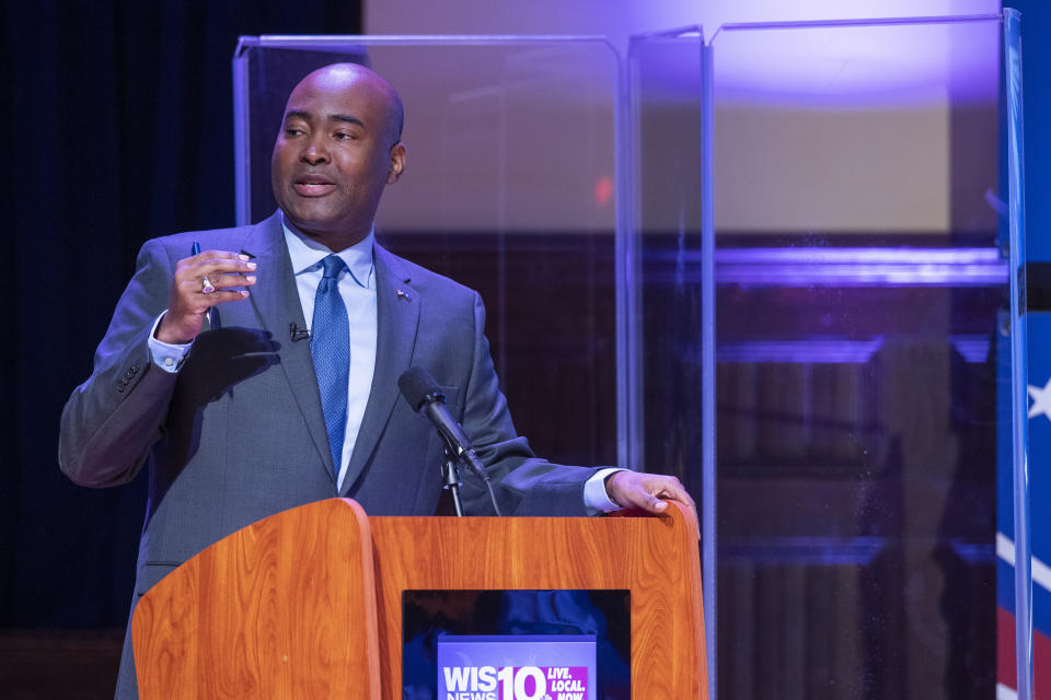 Democratic challenger Jaime Harrison and Senator Lindsey Graham, R-S.C., face off in the South Carolina U.S. Senate debate at Allen University in Columbia, S.C., Saturday, Oct. 3, 2020. (Joshua Boucher/The State via AP)