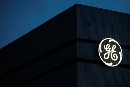 The General Electric logo is pictured on the General Electric offshore wind turbine plant in Montoir-de-Bretagne, near Saint-Nazaire, western France, November 21, 2016. REUTERS/Stephane Mahe