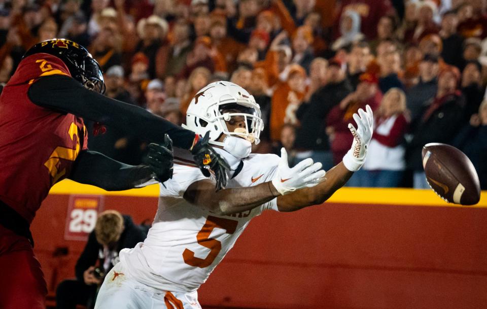 Texas wide receiver Adonai Mitchell can't control a catch in the end zone during the first half of Saturday night's Big 12 game against Iowa State in Ames, Iowa.