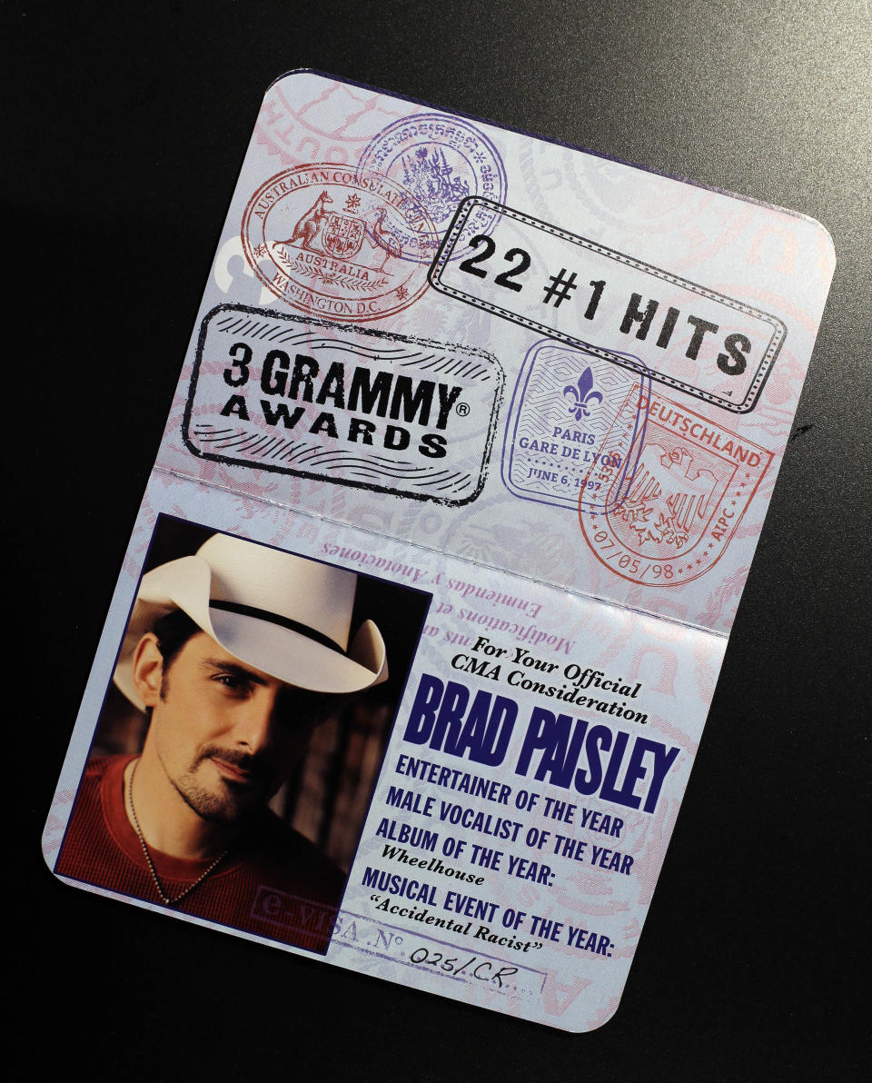 This Oct. 30, 2013 photo shows a Brad Paisley passport that was produced to influence voters of the CMA Awards in Nashville, Tenn. The CMA encourages artists and their labels to educate voters, allowing three email blasts and one mailed product a year. (AP Photo/Mark Humphrey)
