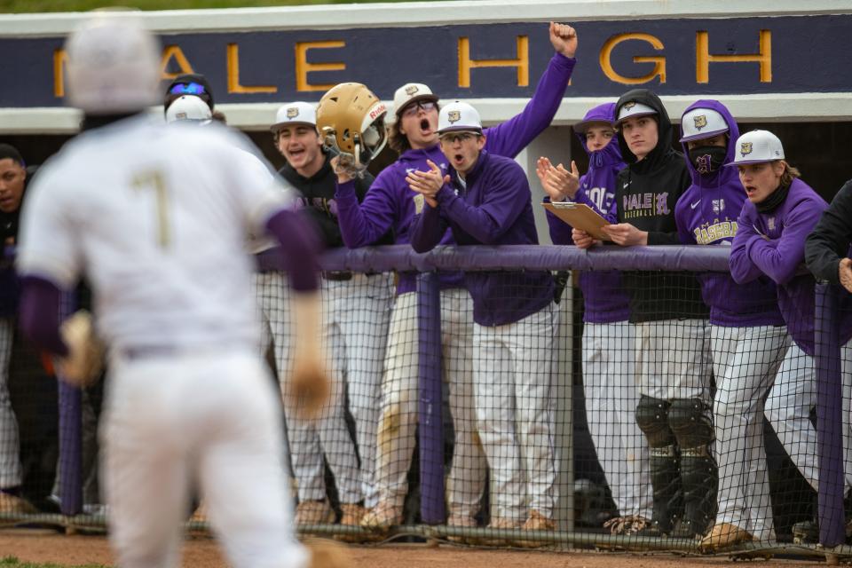 Louisville Male's dugout reacts to a walk in the third inning against Trinity. The Bulldogs scored five runs in the third. March 30, 2022