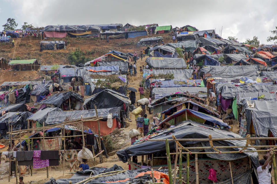 -FILE- In this Friday, Sept. 22, 2017 file photo newly set up tents cover a hillock at a refugee camp for Rohingya Muslims who crossed over from Myanmar into Bangladesh, in Taiy Khali, Bangladesh. Gambia has filed a case at the United Nations' highest court in The Hague, Netherlands, Monday, Nov. 11, 2019, accusing Myanmar of genocide in its campaign against the Rohingya Muslim minority. A statement released Monday by lawyers for Gambia says the case also asks the International Court of Justice to order measures "to stop Myanmar's genocidal conduct immediately." (AP Photo/Dar Yasin, file)