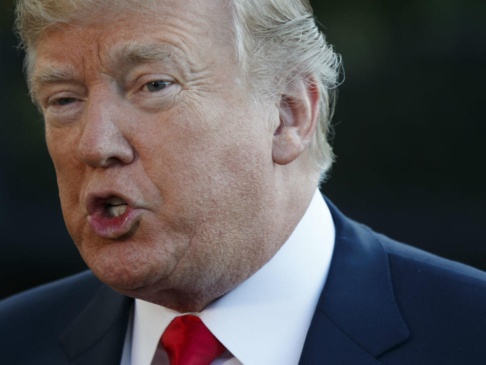 President Donald Trump speaks with reporters before departing the White House for a trip to Asia, Friday, Nov. 3, 2017, in Washington: AP Photo/Evan Vucci