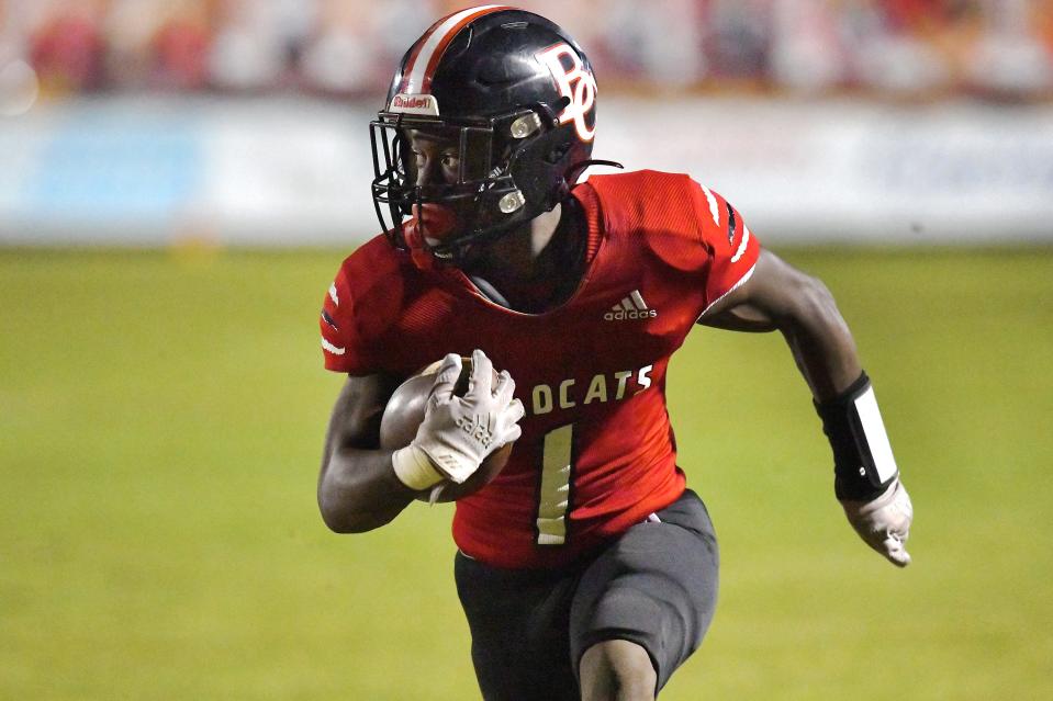 Baker County running back Cam Smith rushes to the end zone for a touchdown in 2021.