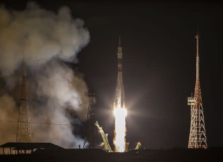 The Soyuz TMA-15M spacecraft carrying the International Space Station crew of Anton Shkaplerov of Russia, Terry Virts of the U.S. and Samantha Cristoforetti of Italy blasts off from the launch pad at the Baikonur cosmodrome November 24, 2014. REUTERS/Shamil Zhumatov