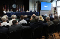 Members of the Tennessee Valley Authority Board of Directors listen to members of the public during a meeting, Wednesday, May 8, 2024, in Nashville, Tenn. The nation’s largest public utility is moving ahead with a plan for a new natural gas plant in Tennessee despite warnings that its environmental review of the project doesn't comply with federal law. (AP Photo/George Walker IV)