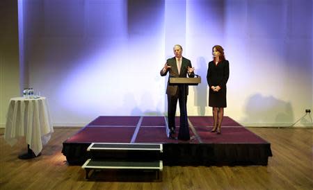 U.S. diplomat Richard Haass speaks, with his assistant Harvard professor Meghan O'Sullivan (R), in the Europa Hotel before chairing inter-party talks designed to resolve issues over parades, flags and Northern Ireland's past, in Belfast September 17, 2013. REUTERS/Cathal McNaughton