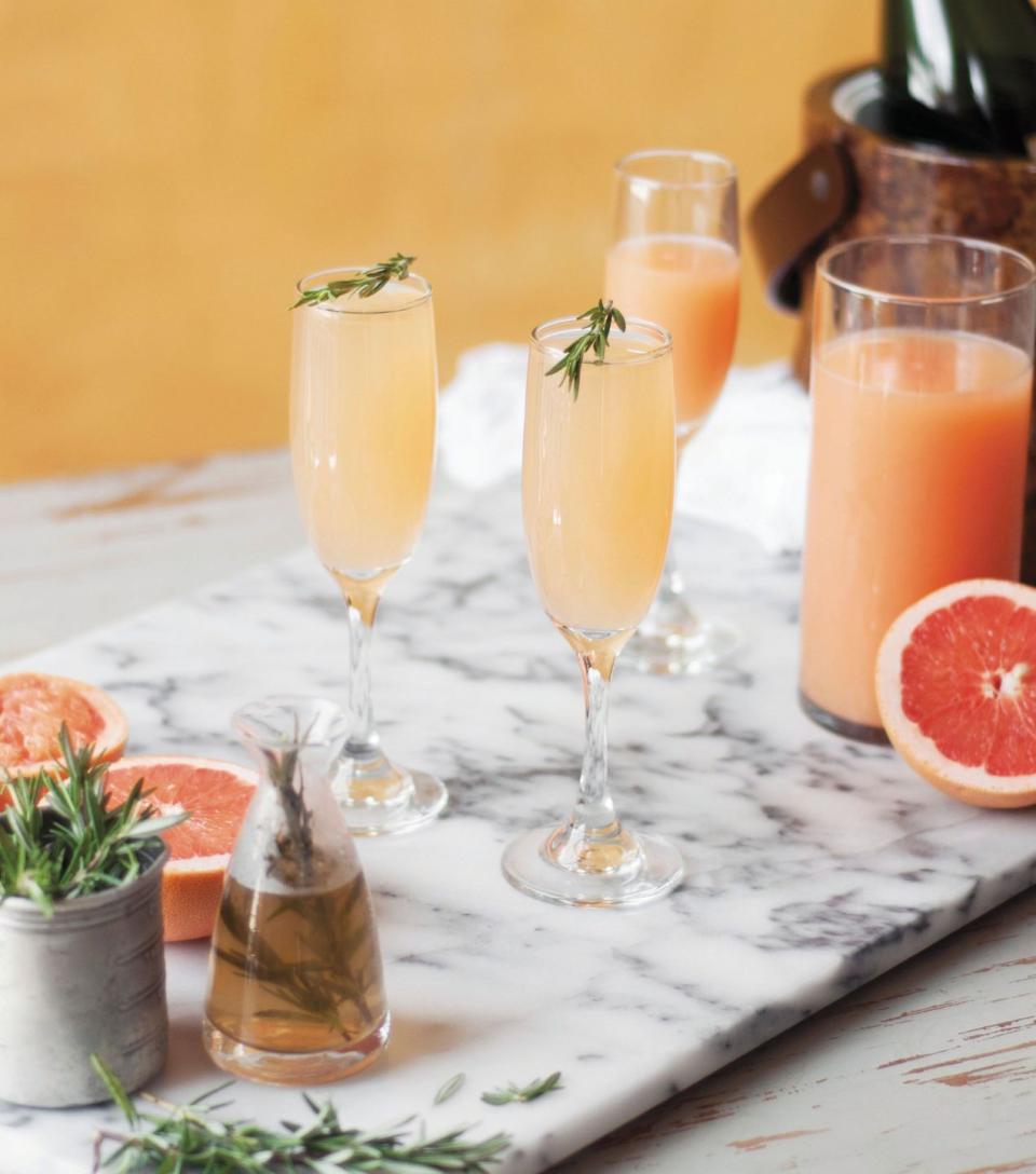 <p>Wintery rosemary and grapefruit give this classic Champagne cocktail a slightly bitter, herbal zing.</p><p><strong><a href="https://www.countryliving.com/food-drinks/recipes/a42606/grapefruit-and-rosemary-mimosa/" rel="nofollow noopener" target="_blank" data-ylk="slk:Get the recipe for Rosemary Mimosa;elm:context_link;itc:0;sec:content-canvas" class="link ">Get the recipe for Rosemary Mimosa</a>.</strong> </p>