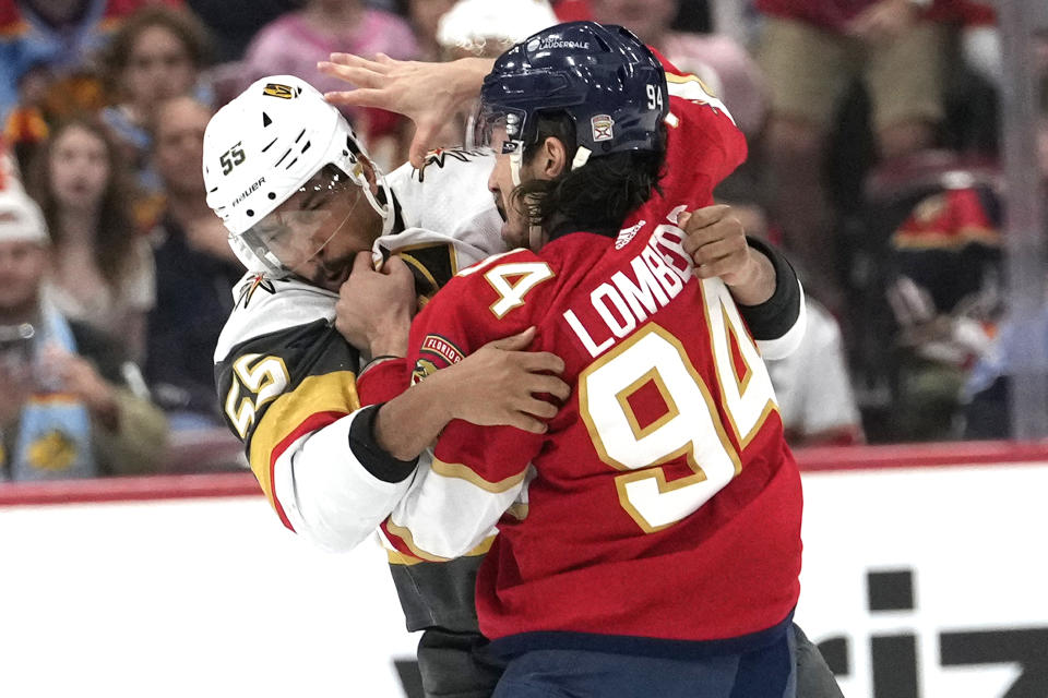 Vegas Golden Knights right wing Keegan Kolesar (55) and Florida Panthers left wing Ryan Lomberg (94) fight during the first period of an NHL hockey game, Saturday, Dec. 23, 2023, in Sunrise, Fla. (AP Photo/Lynne Sladky)