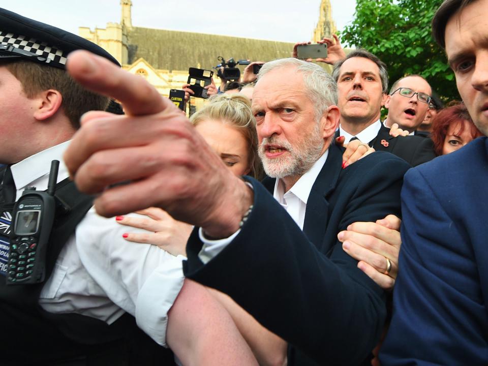 Labour leader Jeremy Corbyn arrives to speak in Parliament Square, where the Momentum campaign group are holding a