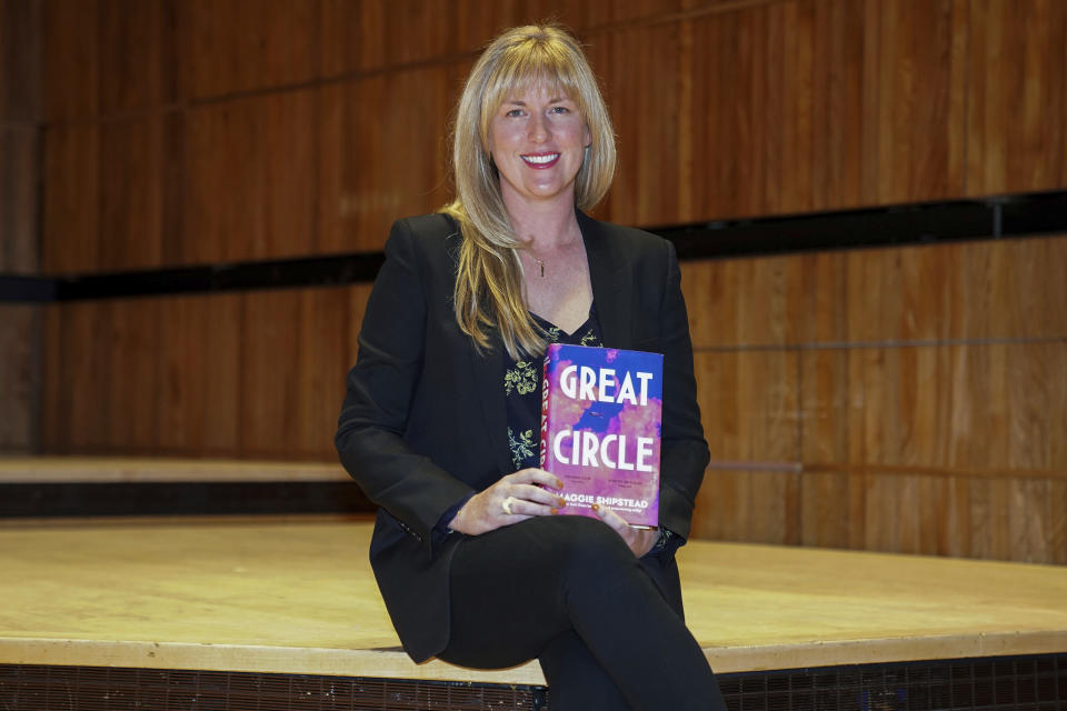 Maggie Shipstead with her book Great Circle, one of the six authors shortlisted for the 2021 Booker Prize, during a photo call at the Royal Festival Hall in London, Sunday Oct. 31, 2021. (Kirsty O'Connor/PA via AP)