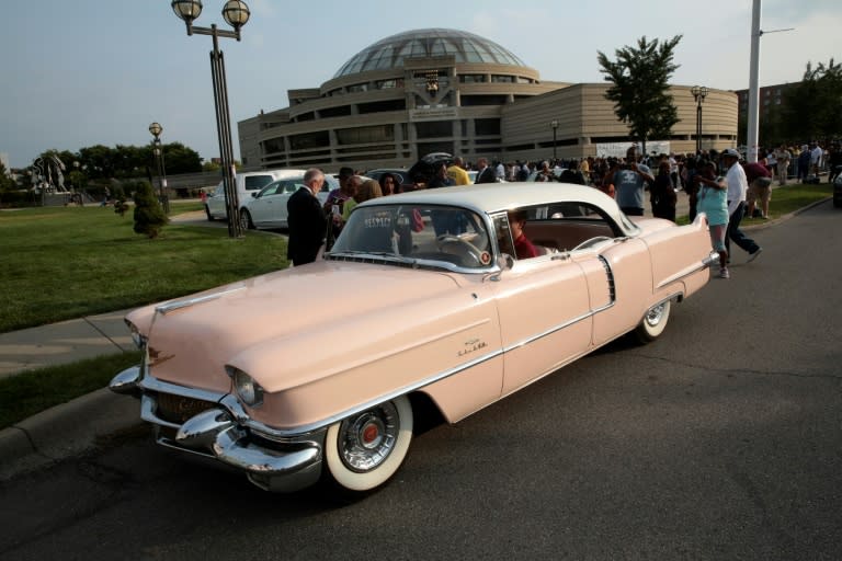 A Cadillac outside the viewing of Aretha Franklin, who in her 1985 hit "Freeway of Love" sang about cruising in a pink model of the iconic automobile