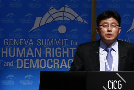 Former North Korean prison guard Ahn Myong Chul addresses the sixth Geneva Summit for Human Rights and Democracy in this file picture taken in Geneva February 25, 2014. REUTERS/Denis Balibouse/Files