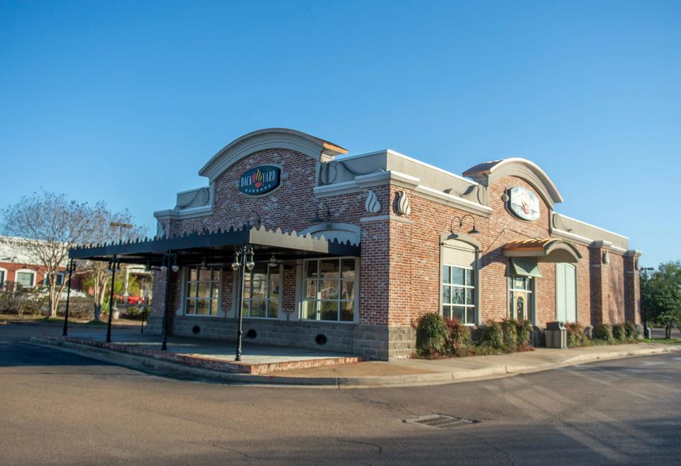 The Backyard Burgers building, on the corner of Main Street and Grandview Boulevard in Madison, Miss., stands empty Monday, Feb. 19, 2024. Renovations to transform the building into a Whataburger are expected to begin within a week or two, according to the company.