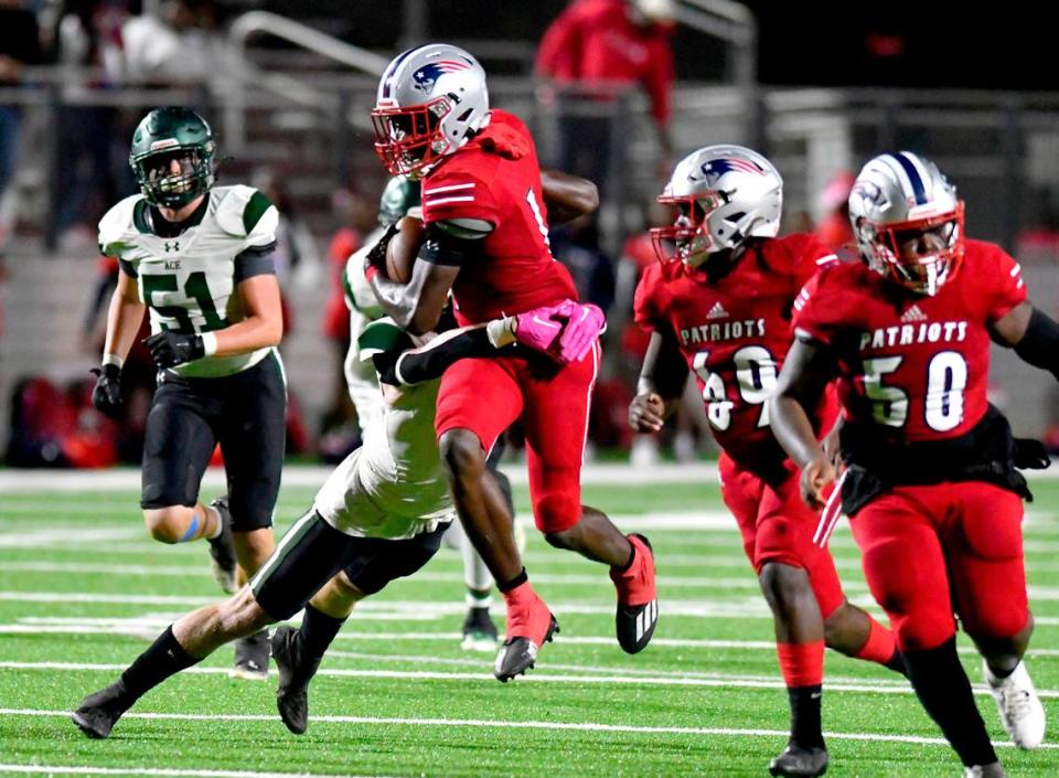 Southwest receiver Carmelo Mays (1) attempts to break a tackle during the Patriots’ 52-51 double overtime win over ACE Thursday night. Jason Vorhees/The Telegraph