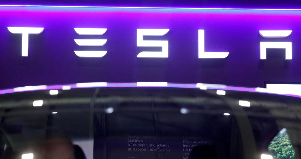 The logo of Tesla on display at the Everything Electric exhibition at the ExCeL London international exhibition and convention centre in London, Britain, March 28, 2024.  REUTERS/Peter Cziborra