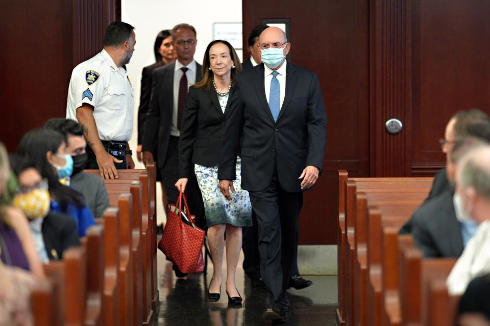 CORRECTS ID OF WOMAN NEXT TO WEISSELBERG TO MARY MULLIGAN - Trump Organization's former Chief Financial Officer Allen Weisselberg, right, arrives in a New York courtroom with his attorneys, including Mary Mulligan, Thursday, Aug. 18, 2022. Weisselberg pleaded guilty Thursday to evading taxes in a deal that could potentially make him a star witness against the company at a trial this fall. (Curtis Means/DailyMail.com via AP, Pool)