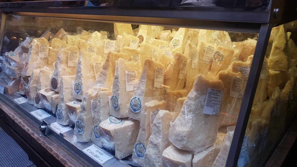 Parmesan on display in a shop window (ES)