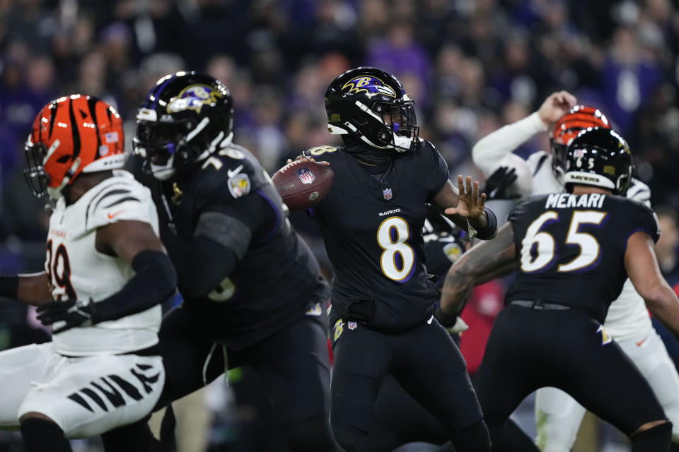 Baltimore Ravens quarterback Lamar Jackson (8) looks to throw in the first half of an NFL football game against the Cincinnati Bengals in Baltimore, Thursday, Nov. 16, 2023. (AP Photo/Matt Rourke)