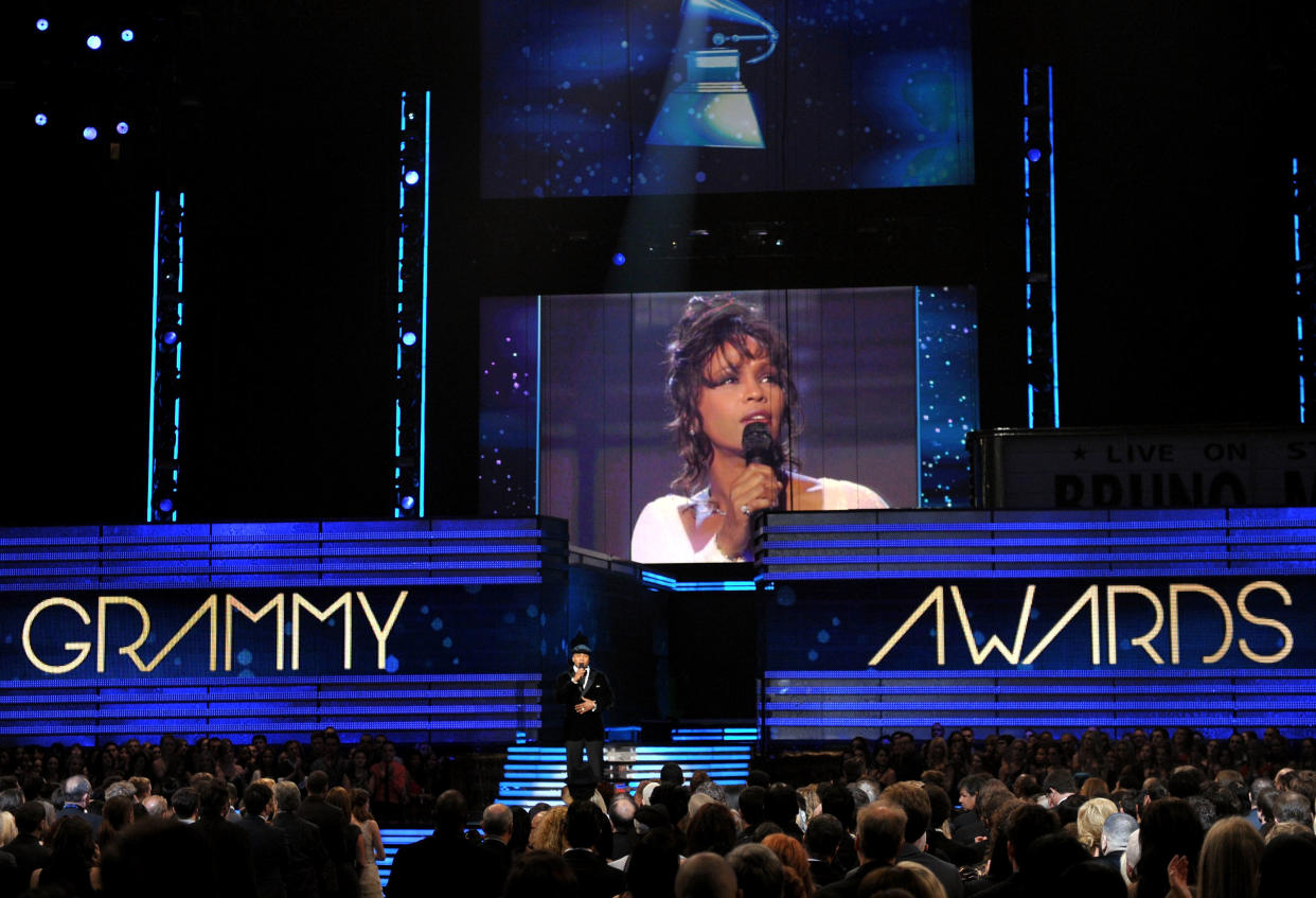 Host LL Cool J pays tribute to the late Whitney Houston onstage at the 54th annual Grammy Awards at Staples Center on Feb. 12, 2012. (Photo: John Shearer/WireImage)