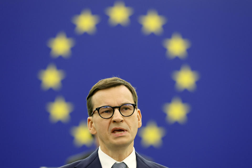 Poland's Prime Minister Mateusz Morawiecki delivers his speech Tuesday, Oct. 19, 2021 at the European Parliament in Strasbourg, eastern France. The European Union's top official locked horns Tuesday with Poland's prime minister, arguing that a recent ruling from the country's constitutional court challenging the supremacy of EU laws is a threat to the bloc's foundations and won't be left unanswered. (Ronald Wittek, Pool Photo via AP)