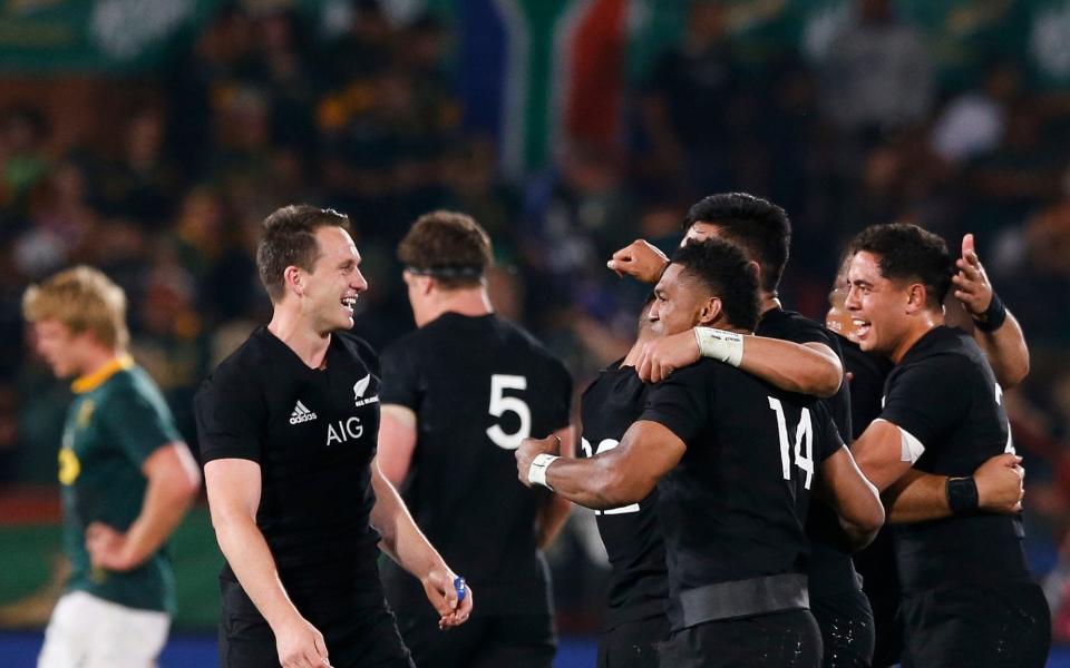 New Zealand celebrate at Loftus Versfeld after battling back from 23-6 down - AFP