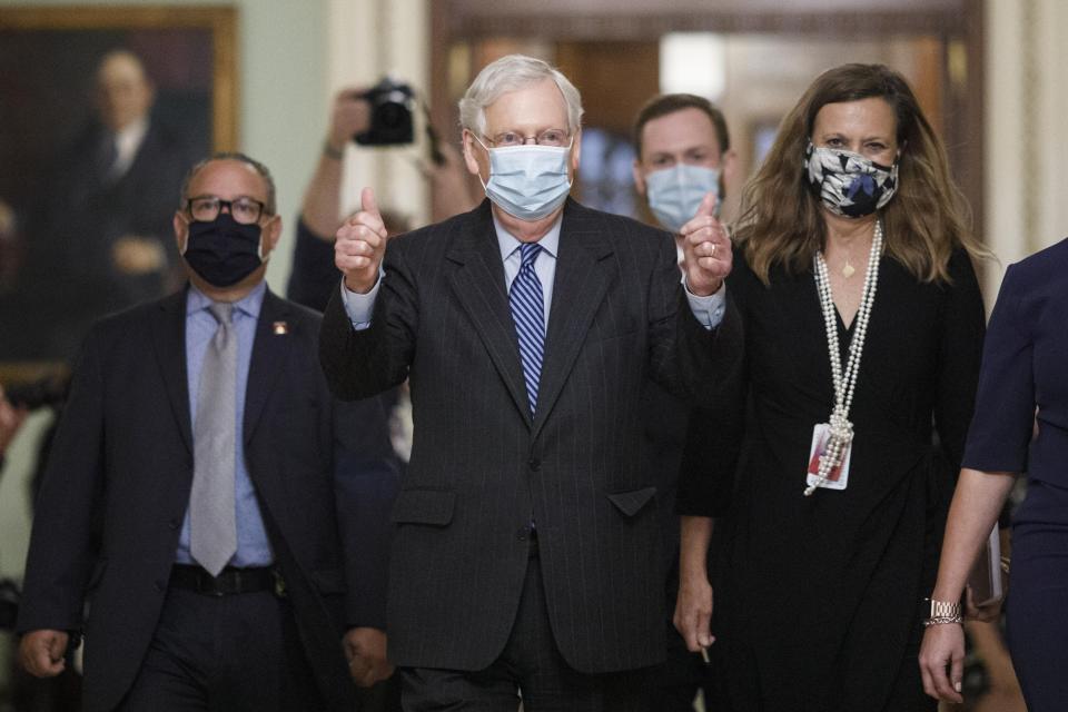 Senate Majority Leader Mitch McConnell walking out the Senate Chamber on Capitol Hill on Monday, the day the Senate voted to confirm Judge Amy Coney Barrett to the Supreme Court. The Senate then adjourned until after the election. (Photo: Xinhua News Agency via Getty Images)