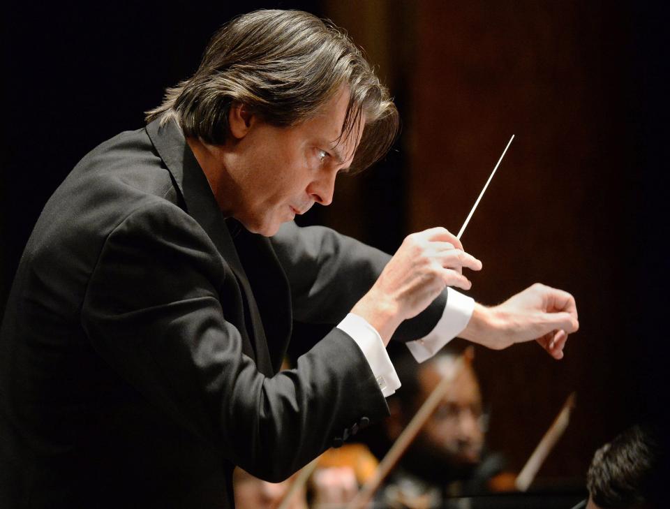 Erie Philharmonic conductor Daniel Meyer leads the orchestra during a performance inside the Warner Theatre on Jan. 18, 2020, in Erie.