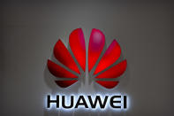 FILE - In this July 4, 2018, file photo, the Huawei logo is seen at a Huawei store at a shopping mall in Beijing. Canadian authorities said Wednesday, Dec. 5, 2018, that they have arrested the chief financial officer of China's Huawei Technologies for possible extradition to the United States. Justice Department spokesman Ian McLeod said Meng Wanzhou was detained in Vancouver, British Columbia, on Saturday, Dec. 2.(AP Photo/Mark Schiefelbein, File)