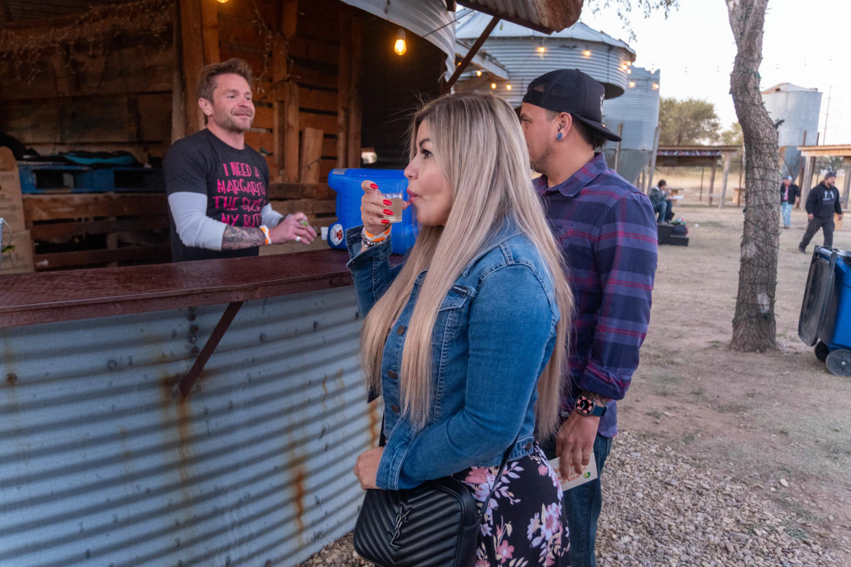 An attendee samples one of the many vendors competing for "Amarillo Best Margarita" at the 2023 Amarillo Margarita and Taco Fest at the Starlight Ranch in Amarillo.