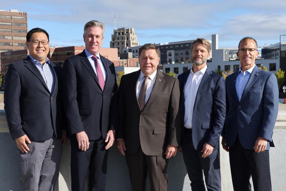 Standing in front of the site of a proposed ambulatory care center at 55 General McConville Way in Quincy are, from left, Dr. David Chiu, vice president of network operations, Harvard Medical Faculty Physicians; Beth Israel Deaconess Medical Center President Pete Healy; Quincy Mayor Tom Koch; Jason Ward, managing director of investments at FoxRock Properties; and Rich Fernandez, president of Beth Israel Deaconess Hospital-Milton.