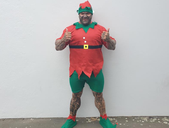 Hamish Hiroki the former Bandidos NZ president dressed in elf outfit to ride 600km to build a homeless shelter. 