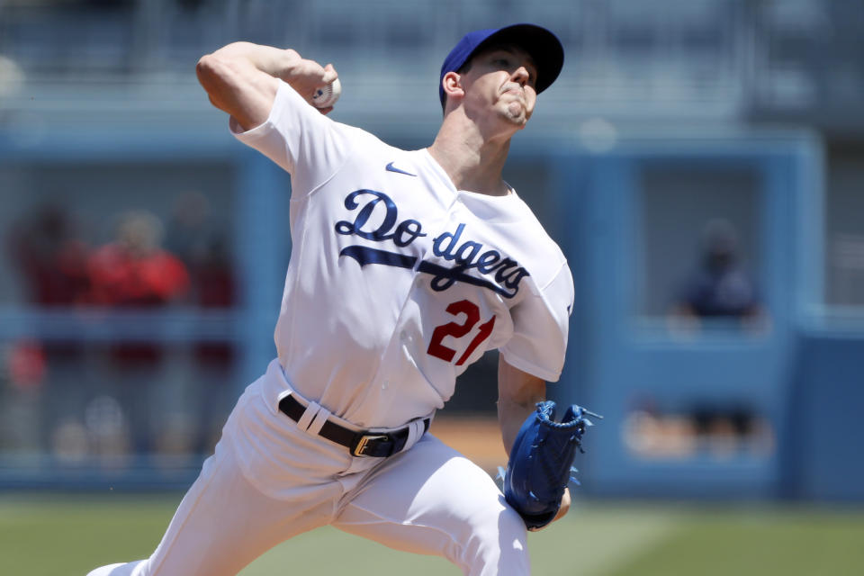 Los Angeles Dodgers starting pitcher Walker Buehler throws to a Los Angeles Angels batter during the first inning of a baseball game in Los Angeles, Sunday, Aug. 8, 2021. (AP Photo/Alex Gallardo)