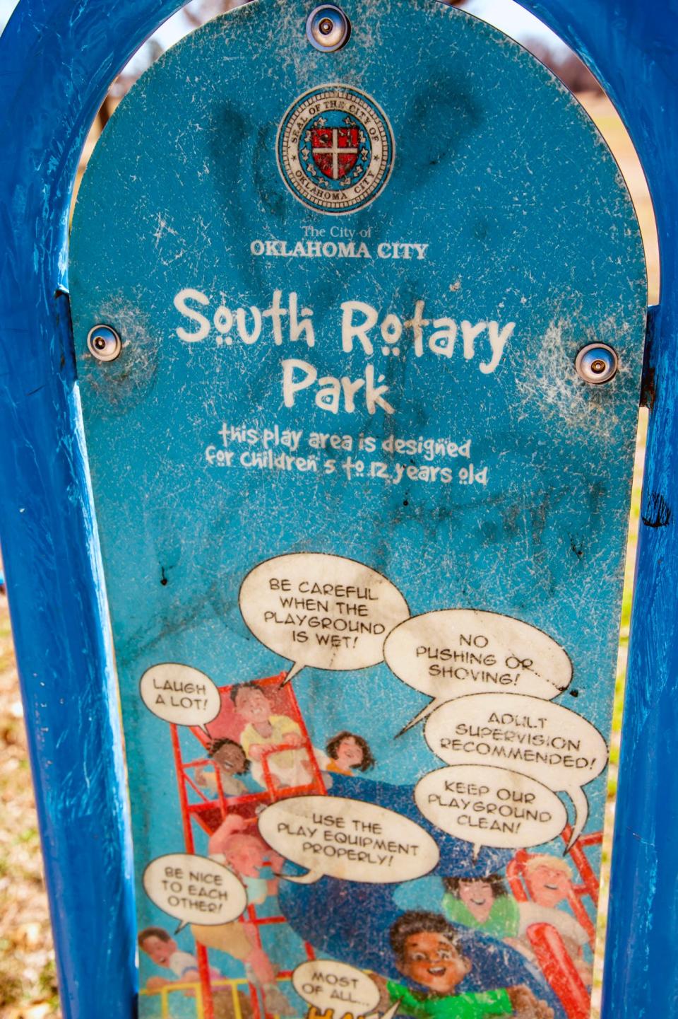 A South Rotary Park sign is pictured Friday on the Oklahoma City park's playground area.