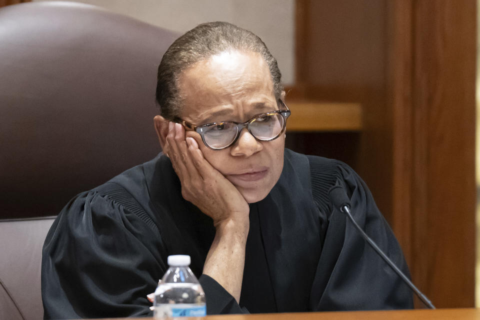 Minnesota Supreme Court Chief Justice Natalie Hudson questions Ronald Fein, attorney for the petitioner, "Free Speech for People," as he argues his case before the court Thursday, Nov. 2, 2023, in St. Paul, Minn. The Minnesota Supreme Court heard arguments to keep former President Donald Trump off the ballot. (Glen Stubbe/Star Tribune via AP, Pool)