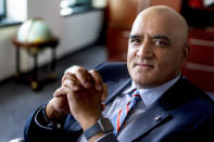 Federal Highway Administrator Shailen Bhatt poses for a portrait in his office, Thursday, March 14, 2024, in Washington. (AP Photo/Andrew Harnik)