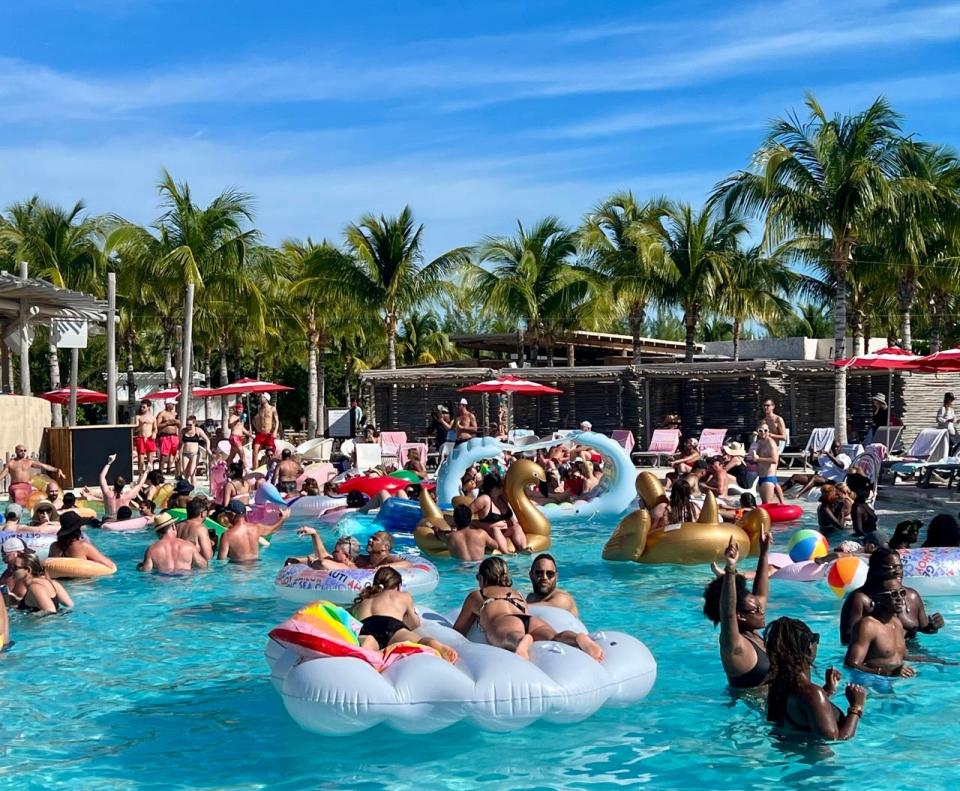 Virgin Voyages Float on Party at Beach Club Bimini, people in floats in pool